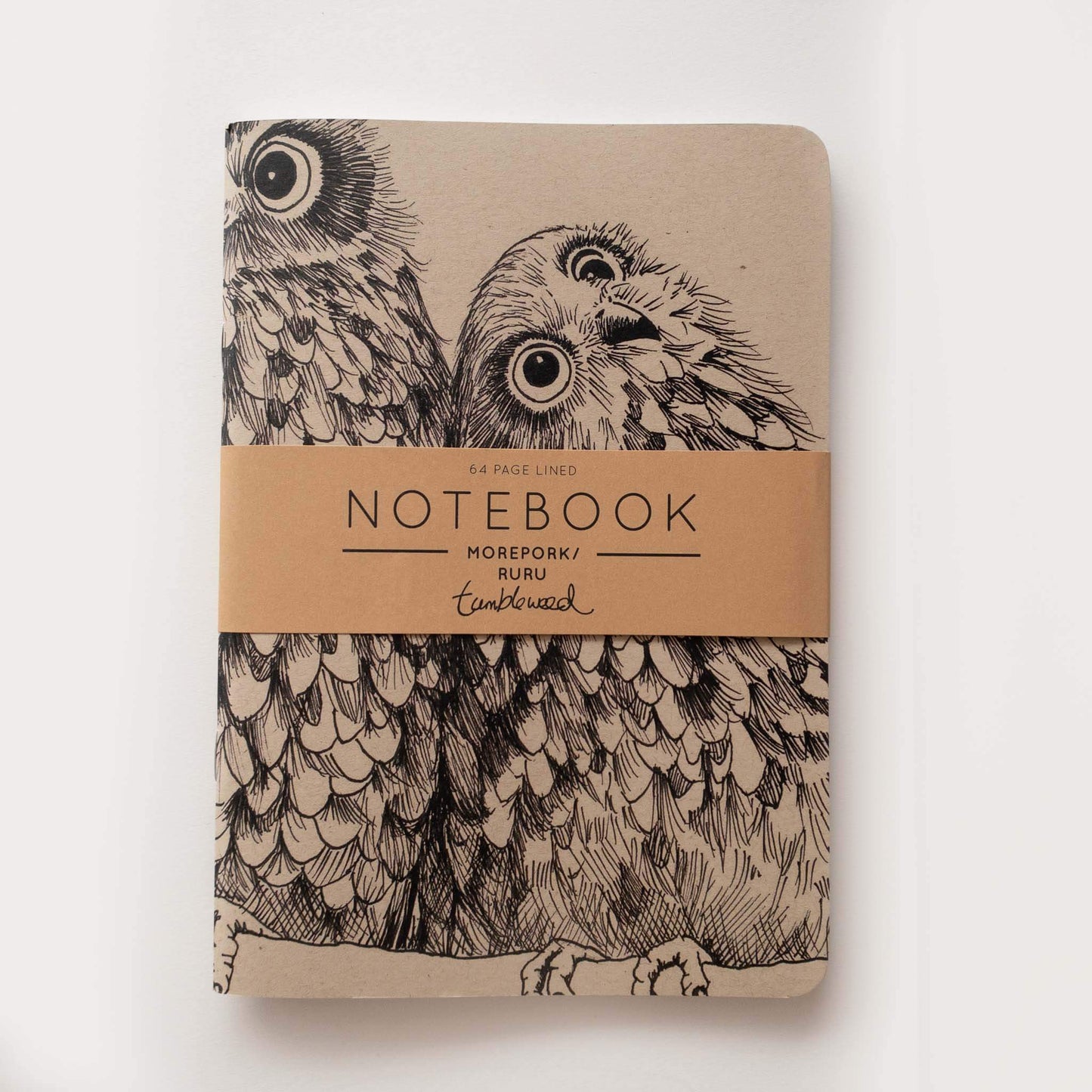 Kraft cover, morepork/ruru notebook with rounded corners, packaged with a kraft belly band.