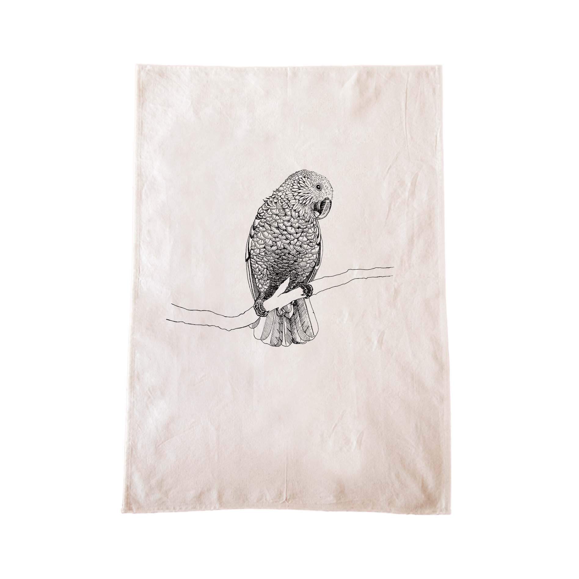 Off-white cotton tea towel with a screen printed Kaka design.