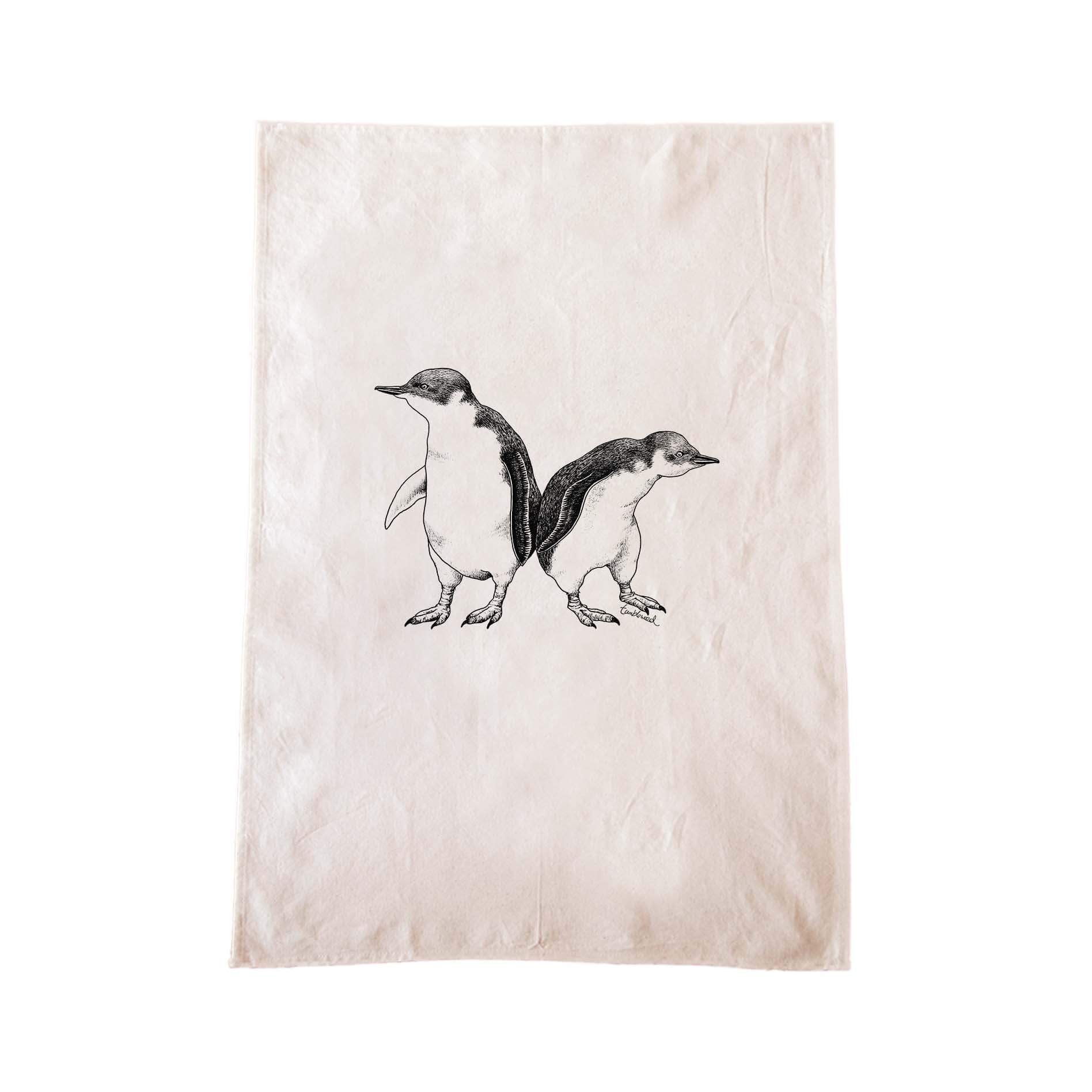 Off-white cotton tea towel with a screen printed Little Blue Penguin design.