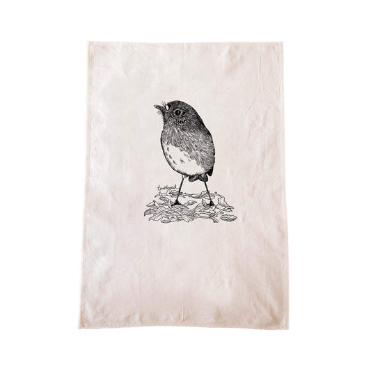 Off-white cotton tea towel with a screen printed North Island Robin/toutouwai design.