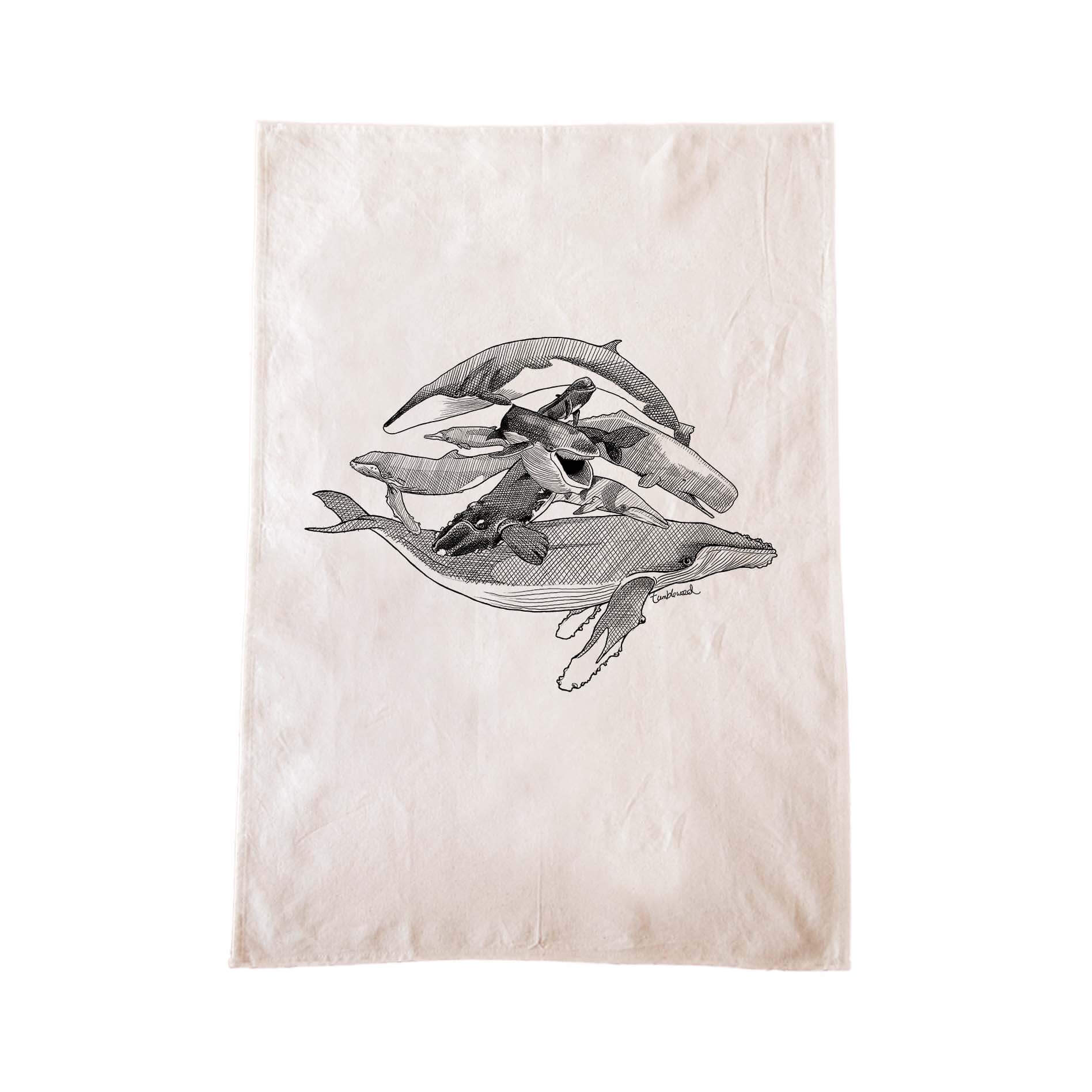 Off-white cotton tea towel with a screen printed Whales design.
