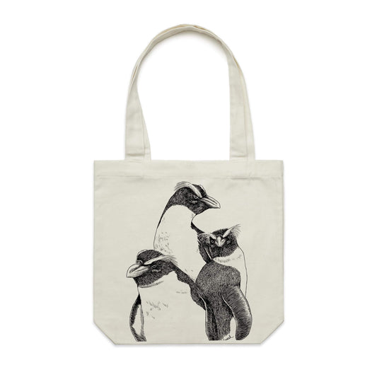 Cotton canvas tote bag with a screen printed Fiordland crested penguin/tawaki design.